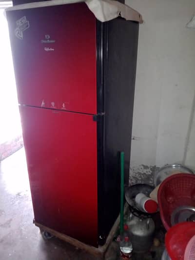 red colour full size fridge in good condition