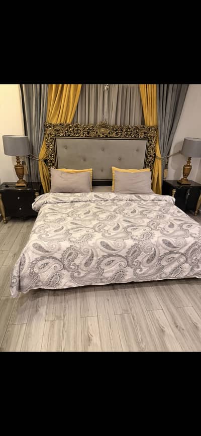 Nm branded designer bed with side tables