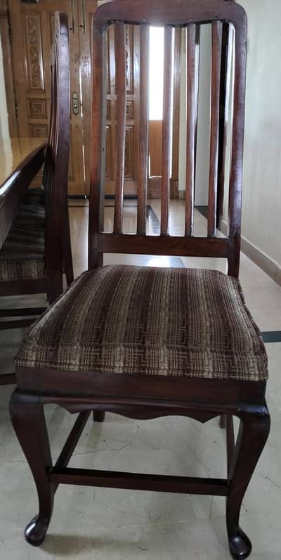 Dinning table and chairs ( quality wood)
