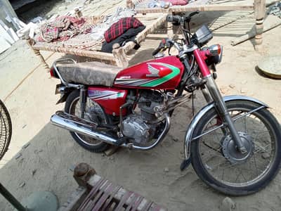 Honda bike colour red Punjab number 03026560904
