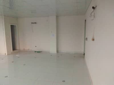 Tile floor hall available for rent in johar town