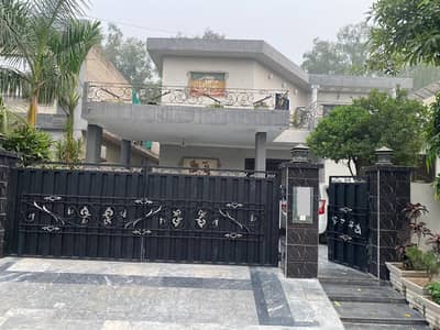 22 Marla Slightly Ultra-Modern Design Most Beautiful 6-Bedroom Bungalow For Sale At Prime Location Of DHA Lahore Near To Park Masjid & Commercial Market.