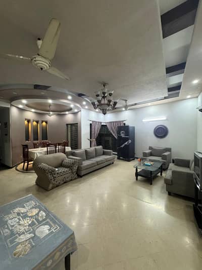 One Kanal Used Modern Design Bungalow For Sale At Prime Location Of DHA Lahore Near To Park Masjid & Commercial Market.