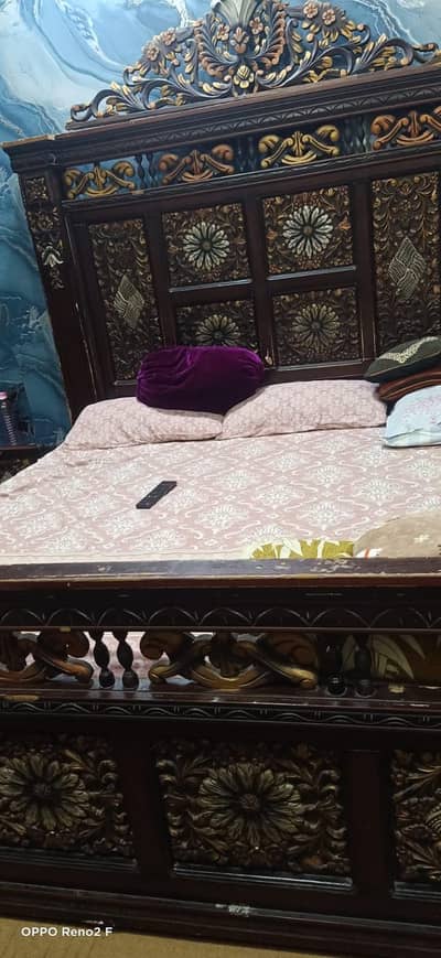 wooden bed home used without mattress