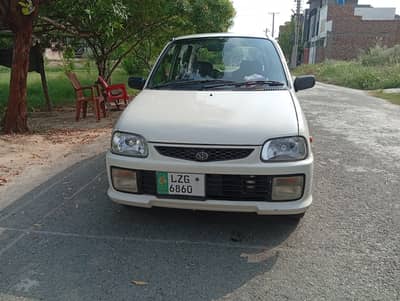 Dihatsu cuore 2004 cx automatic