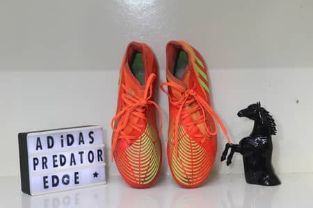 Football cleats and grippers