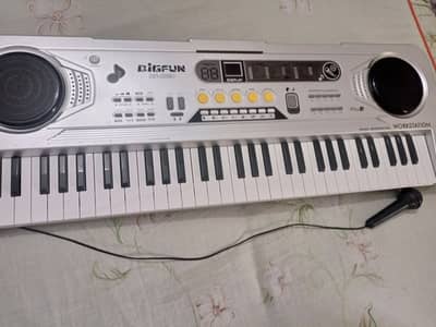 Piano with mic and toy remote control car