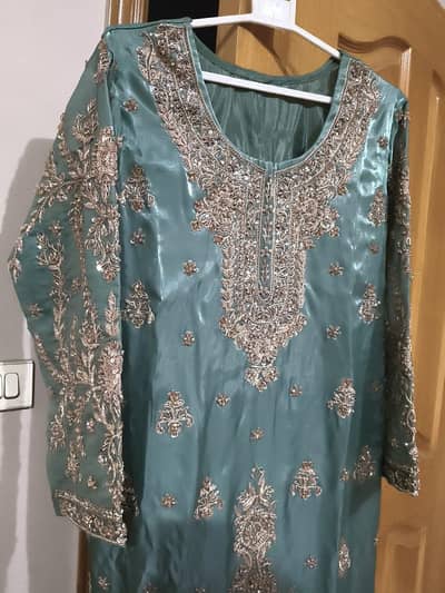 Wedding wear three piece, shirt, dupatta and pent trousers. Rs 20k.