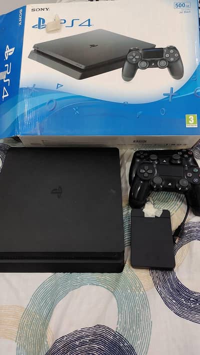 PS4 SILM WITH 2 CONTROLLER AND BOX