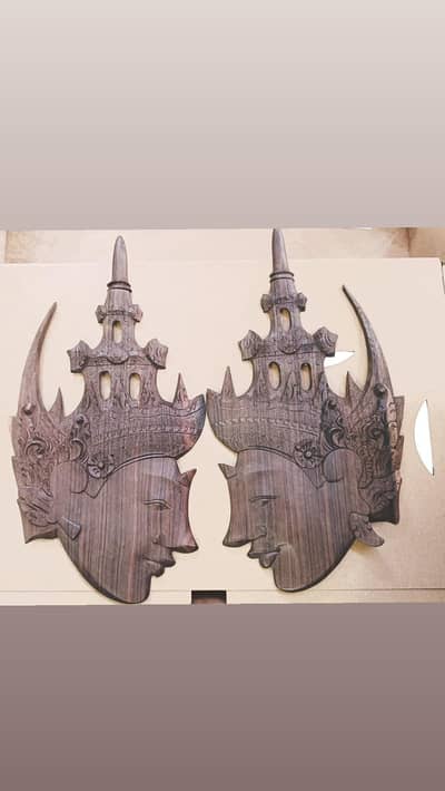 Hand carved wooded wall art