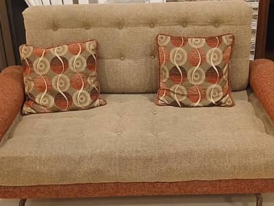two sets of 2 seater sofas