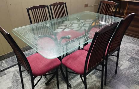 Dining table with glass top