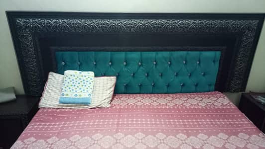 king size bed with two side tables