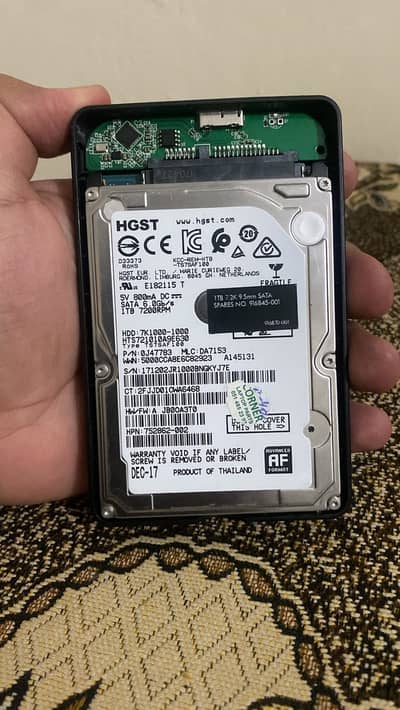 1tb hdd for sale 100% heatlh with external case.