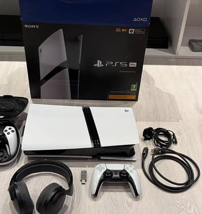 PS5 pro 2 controllers disc drive with box 5 game urgent sale