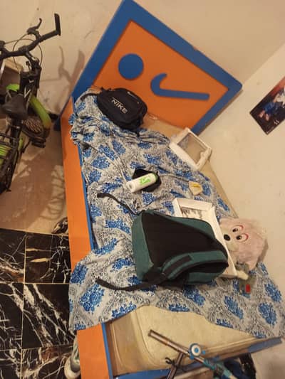 bed and almari