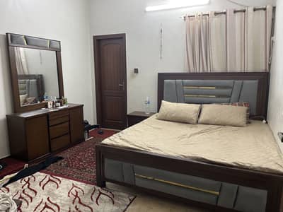 King size bed with table and dressing