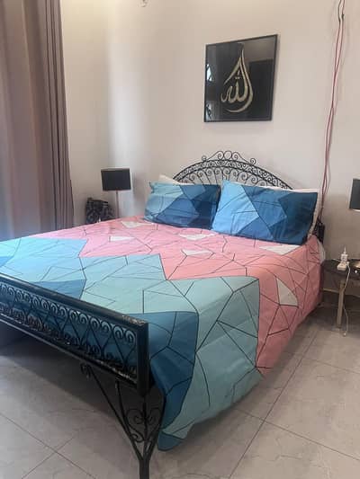 Iron rod bed with metress or side tables for sale