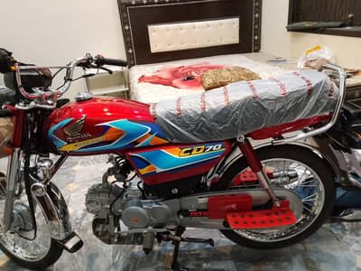 Honda CD 70  2026 model red color
