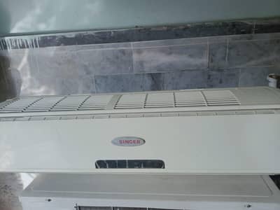 singer AC full oko