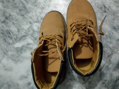 2 Brown pairs of shoes for 6,7 year old