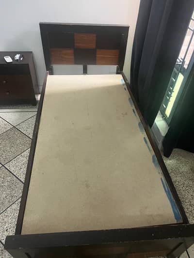 Single beds (2) with master mattresses