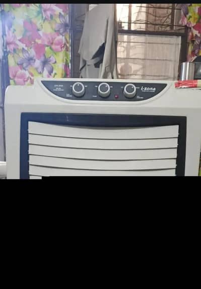 I zone good condition air cooler ful size brnd new lia tha 8month phly