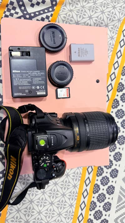 Nikon D5600 DSLR camera for sale with Nikon 18–140mm VR lens