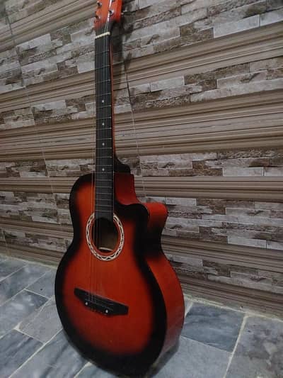 biggner guitar for sale in medium condition good qulity sound