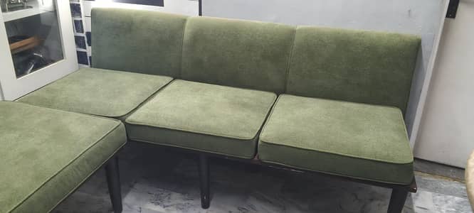L shaped sofa with center table