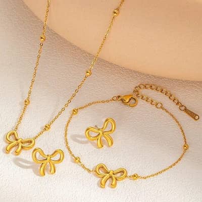 Elegant Gold Bow Jewelry Set – Necklace, Ring & Bracelet (3 Pcs)