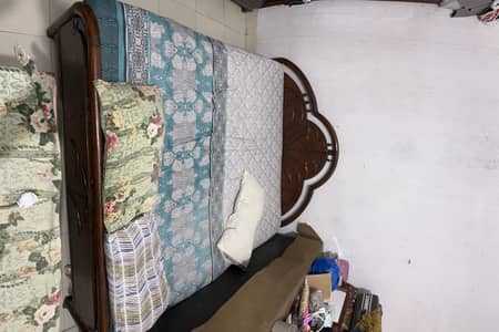 old bed with mattress