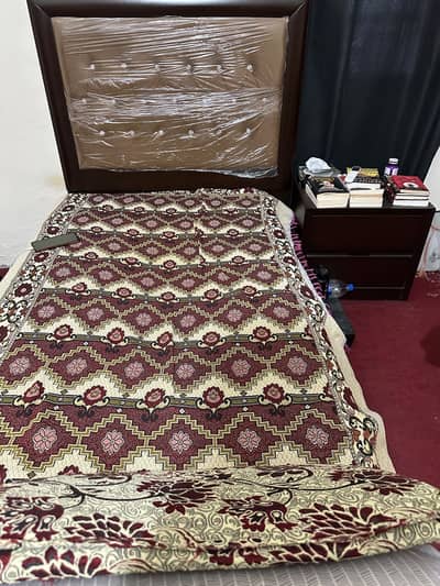 Single bed with side table
