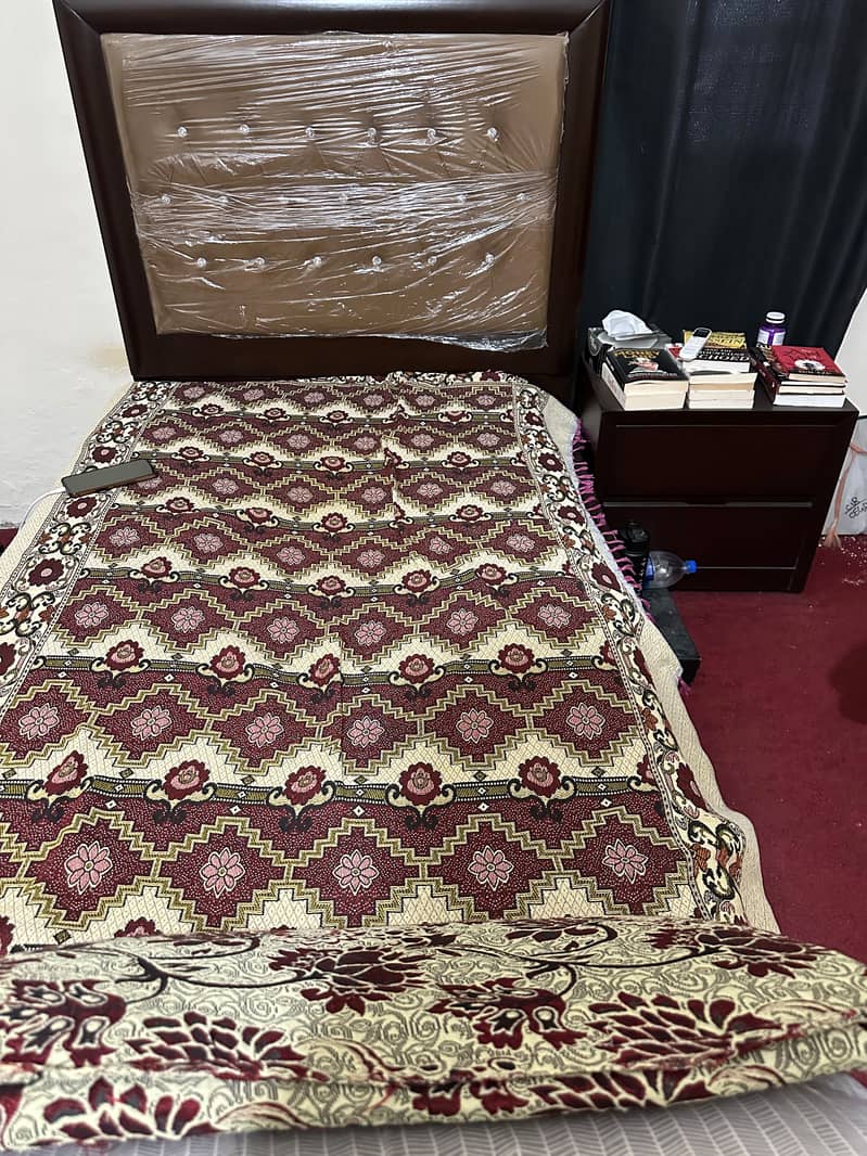 Single bed with side table 0