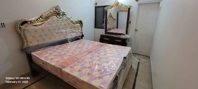 Wooden king size bed and dressing table