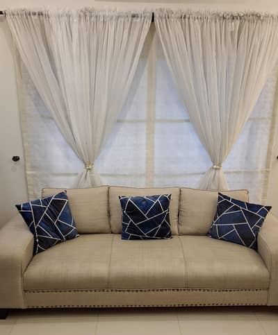 5 seater used sofa set with coushions