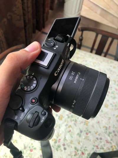 Canon R8 with 24-50mm rf lense along with 4 batteries 2 chargers.