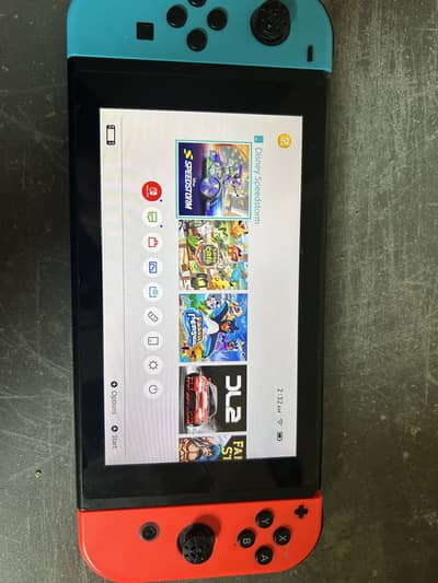 NINTENDO SWITCH WITH RESIDENT EVIL TRIPLE PACK