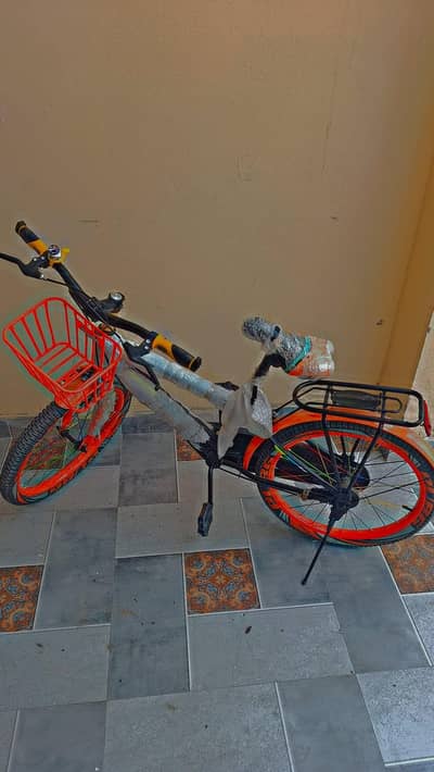 giant orange colour bicycle for sale new condition