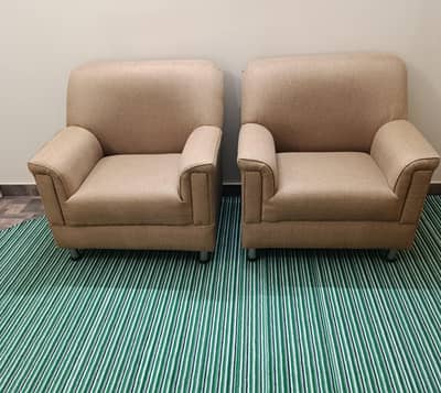 Two Single Seat Sofas