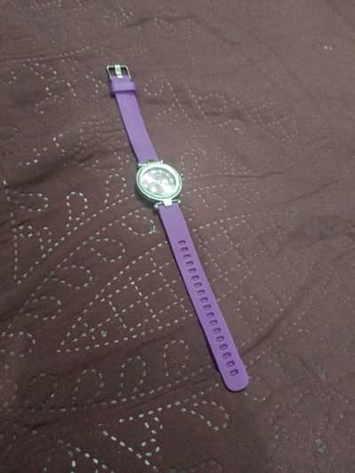 purple watch in working condition