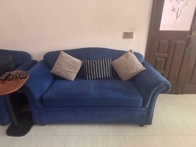 Very vibrant blue color sofas