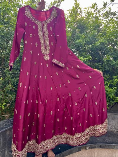 Long frock in pink color.
