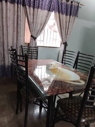 Dining table with chairs.