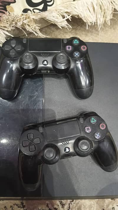 PS4 video game with two controllers