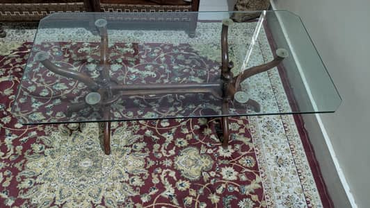 table, curtains and flowers