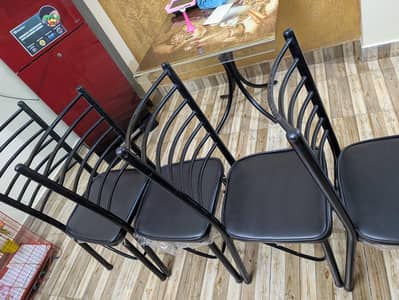beautiful dining table with 4  chairs