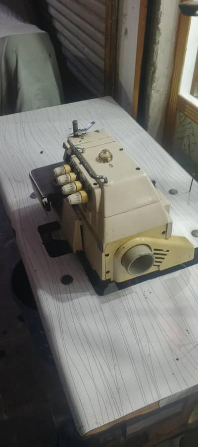 owerlak machine