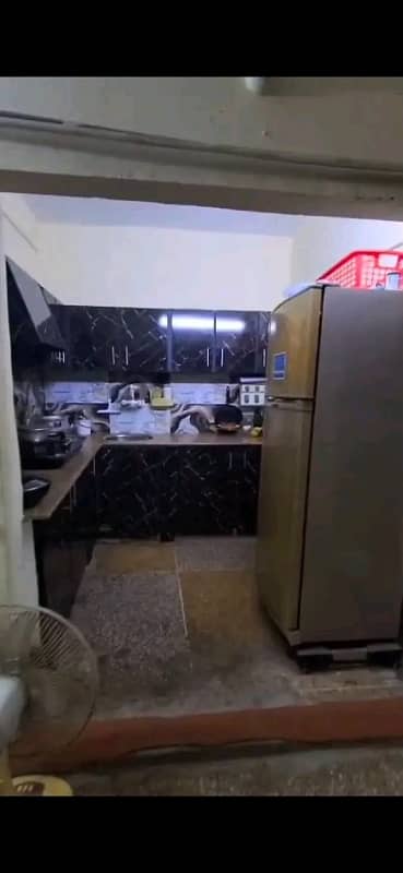 North Nazimabad Block K Flat Available For Sale 1st Floor 2 Bed DD Corner Old Building