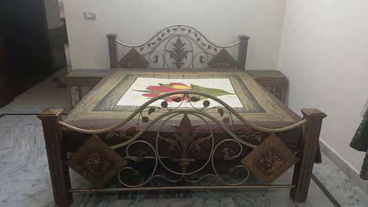 Iron king sized bed with mattress ,side tables and dressing table